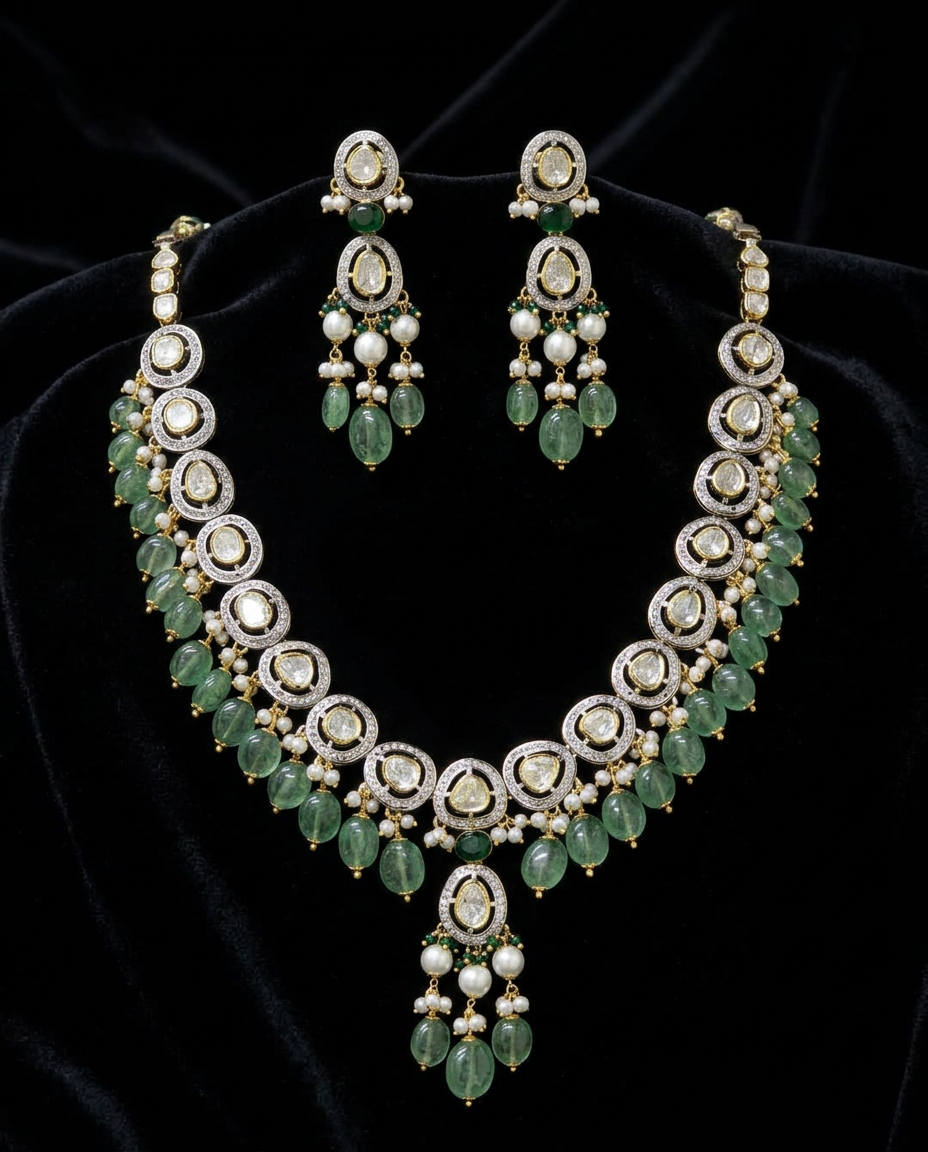 The Emerald Vine Rivière — rose-cut polki, carved emerald beads, pearl fringe, 22kt gold