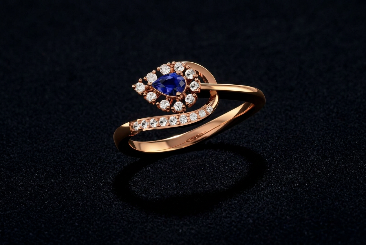 The Neelanjali Bypass — pear blue sapphire bypass ring, pavé shank, 18kt rose gold